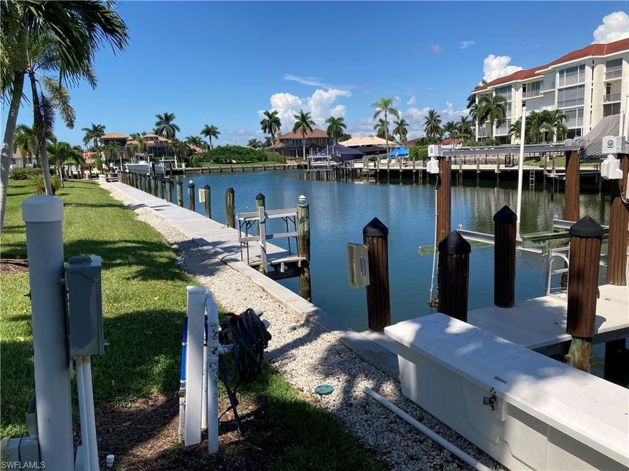 BOATERS • INVESTORS • BEACH LOVERS
DON’T MISS THIS OPPORTUNITY
Imagine unwinding in this beautiful, move-in ready condominium which includes a deeded boat slip and 10lb lift with direct access to the Gulf of Mexico through Caxambas Pass. Watch the dolphins play from the privacy of the waterfront lanai. This bright and sunny corner end unit is a fabulous coastal remodel. This impeccable abode is being sold “turnkey” with 50K of new tropical décor, comfortable furniture, smart tvs and full-size washer & dryer. The spacious open-concept kitchen features stylish gloss cabinetry, stainless steel appliances (Bosch GE), and quartzite countertops with a breakfast bar that seats four. Both bedrooms have generous walk-in closets.
 Hurricane Impact windows and lanai sliders provide the ultimate
In storm protection. Beach and boating accessories are included.
Vantage Point is a meticulously landscaped waterfront condominium
located a short, six block walk from Marco Island’s desirable south beach …. and pet-friendly too !