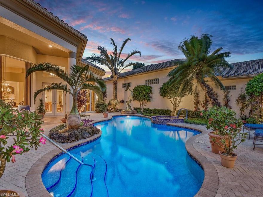 Welcome to your own private oasis in Grand Isle at Pelican Marsh!  As you walk through the entry doors you are met by a large private courtyard oasis, the peace and tranquility can be felt immediately. Enjoy the luxury pool and spa or relax in one of the lounging areas and take in the beauty of the tropical plants and landscaping. Enter the main home where you will find a large master suite opening onto the rear screened lanai with views of the lake and fountain. The main home is 2 bedrooms 2 bathrooms and a den/office. The large open floor plan flows  from the family room and kitchen to the living room and dining room.  The vast expanse of windows and sliders overlooking the courtyard truly bring the Florida lifestyle to reality.  The poolside cabana offers 2 bedrooms, 1 bathroom and a kitchenette perfect for guests or as a home office. Pelican Marsh offers an active tennis center, fitness center, spa and bocce court. Enjoy miles of bike and walking paths through mature, lush landscaping. Private shuttle to the beach available. Several levels of membership are available at the Golf Club. Conveniently located near the Mercato, Whole Foods and the white sand beaches of the Gulf.