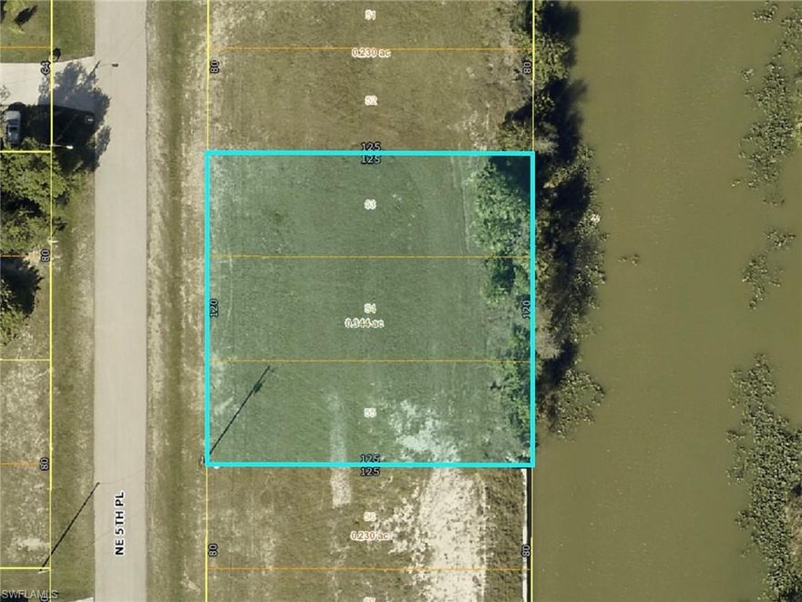 Introducing an exceptional opportunity to own a prime piece of property at **1225 NE 5th Pl, Cape Coral, Florida**. This oversized lot, measuring 120'x125', is perfectly positioned along a peaceful freshwater canal, offering a unique blend of natural beauty and potential.

Envision the possibilities as you design your ideal home in this serene setting. Wake up to the gentle sounds of nature and enjoy picturesque views of the water from your future backyard. The spacious canal offers a private oasis for water activities like kayaking, canoeing, or simply relaxing by the water’s edge.

This lot is nestled in a quiet, yet rapidly growing neighborhood, providing a tranquil escape while still being conveniently close to all the amenities you need. Just minutes away, you'll find the vibrant downtown Cape Coral area, filled with dining, shopping, and entertainment options. Plus, the beautiful beaches of Southwest Florida are easily accessible, perfect for weekend getaways or daily strolls by the sea.

Whether you're planning to build your dream home or looking for a valuable investment opportunity, this property offers limitless potential. Don’t miss the chance to secure your own slice of paradise at 1225 NE 5th Pl, Cape Coral. This is a rare find that won't last long—make it yours and start creating your dream lifestyle today!