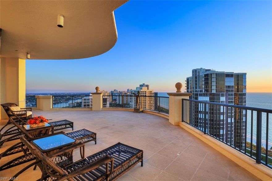C1386 - Not a one of a kind ... an ONLY of a kind opportunity to seize this Seasons Penthouse mansion in the sky featuring interiors over 11,000 square feet under air with the best 360 degree views Naples has to offer.  Spacious and well spread out 4 bedrooms + a den plus an office, movie theater room and Cigar/Wine bar room plus 5 1/2 baths. Grand main entry with soaring ceilings, chef’s kitchen, walk-in wine cellar, spa treatment room/ sauna , work out room/gym and more. The master suite boasts a spacious outdoor deck and unrivaled views along with a decadent bath including his & her quarters and a relaxation tub. Enjoy endless, breathtaking Sunrises and Sunsets over the Gulf of Mexico and bay on an enormous, almost 5000 SF outdoor living space. Combining the outstanding amenities of The Seasons at Naples Cay located inside the private and secluded gated beachfront community of Naples Cay, this Only of a Kind Penthouse is the pinnacle of luxury living. Steps from the beach, shopping and fantastic dining At the Village on Venetian Bay and Waterside Shops.