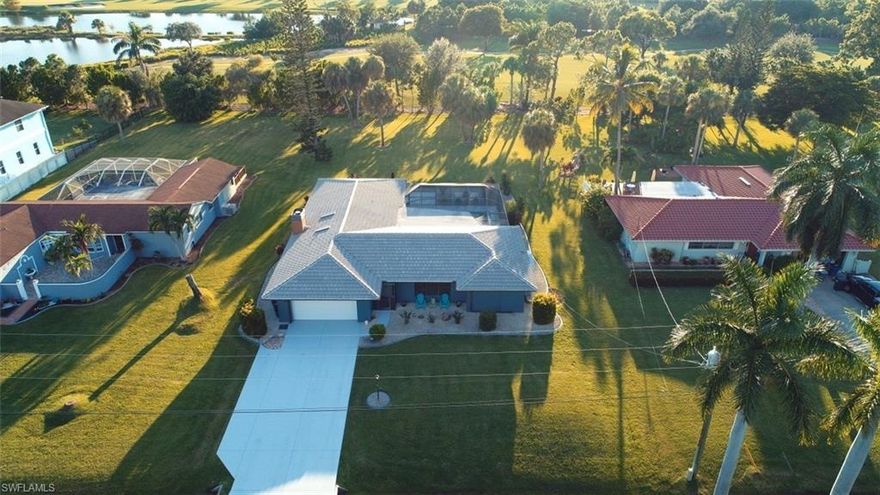 Beautiful 4/3 home on a Private Golf Course in the Heart of South Ft. Myers. Situated on 1/2 ACRE Lot near the end of a very quiet dead end street of only 10 houses. This home features an oversized 2 car garage, large pool, fairway views, partial automatic storm shutters, split floor plan, vaulted ceilings in family room, fireplace, irrigation system, and too many updates to list. Plus, NO Deed Restrictions or HOA fees! With a membership (not included) to Cypress Lake Country Club enjoy the Championship Golf Course, Tennis, Bar and Restaurant from your own backyard! Convenient to Sanibel Island Beaches, HealthPark and GulfCoast Hospitals, Schools, and Punta Rassa Boat Ramp. This home must be seen to fully appreciate!