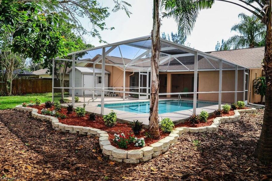 Wait no further for that SW Cape Coral Pool home you have been searching for.  You have to see this!  It is better than new!  From the moment you walk into your 3 bedroom, 2 bathroom, 2 car garage home you will see how open and inviting it is with its over 17-- sq ft of under air space.  The floors are all tile with high profile baseboards, crown and trim everywhere.  Even the window blinds have trim around them.  New Ceiling fans, plant shelves, new fixtures, and new lighting.  Kitchen features new stainless steel appliances, tile countertops, custom backsplash, and unique wood cabinets.  It even has its own private get away garden complete with pond, natural vegetation and all completely private. Bedrooms have all new carpet and master batroom features separate his and her sinks.  Mature landscaping and palm trees finish off the best that SW Florida has to offer.  Come see it today!