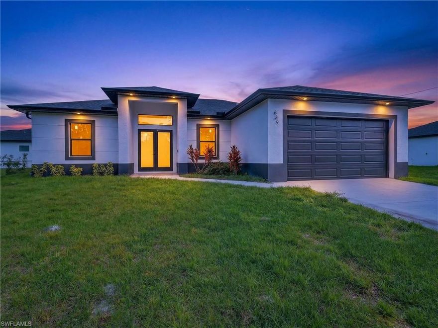 Stunning brand-new home located on a desirable corner lot with a peaceful canal view in the back, offering added privacy and extra outdoor space. This home features modern touches throughout, designed with today’s lifestyle in mind. Including a stylish built-in coffee station, perfect for your morning routine. Conveniently located in Lehigh Acres, just minutes from State Road 82, providing easy access to shopping, dining, schools, and major routes. Enjoy the benefit of being close to the heart of Lehigh while still having the serenity of canal-side living. Beautiful
opportunity to own new construction in one of the area’s fastest-growing communities!