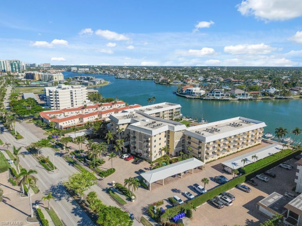Photo of 3000 Gulf Shore BLVD N #202, NAPLES, FL 34103 (MLS # 225080325)