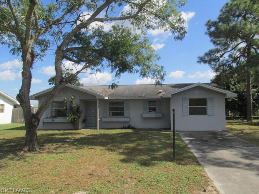 Great starter home - solid CBS construction - 3 bedrooms, 1 bath, plus bonus room for storage or workshop.  Large living room.    House needs updates and is sold AS IS with right to inspect.