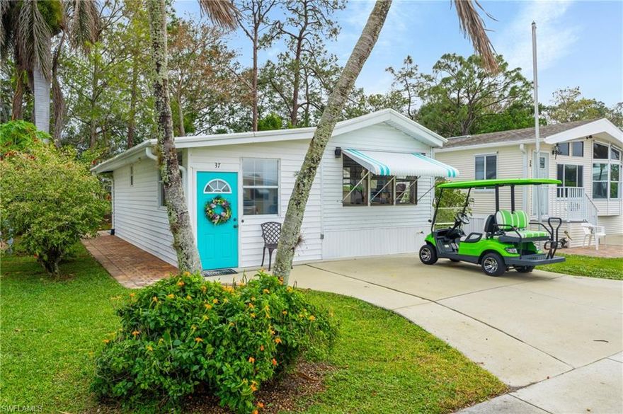 Price recently reduced by a motivated seller. Discover easy, low-maintenance living in this fully furnished manufactured home featuring 1 bedroom plus a flex room and 2 bathrooms, located in the 55+ gated community of Imperial Wilderness, where you own the land. This true move-in-ready residence lives larger than expected and offers a bright, open layout with ample storage and a dedicated workshop. The versatile flex room, shown in the photos as a second sleeping area, is ideal for guests, a home office, or hobby space. Thoughtfully updated in 2022 with a coastal kitchen backsplash, upgraded lighting, fresh interior and exterior paint, upgraded paver walkways, and a new AC unit, the home is fully finished and ready to enjoy. Outdoor living is enhanced by a private, tree-shaded patio with grill and patio furniture included. No recent hurricane damage and no known flood history. Imperial Wilderness offers resort-style amenities including two pools, spa, fitness center, pickleball, tennis, shuffleboard, clubhouse, dog park, and an active social calendar, while the low quarterly HOA includes water, sewer, cable, lawn care, trash, and full access to amenities. Ideally located near shopping, dining, Marco Island, and downtown Naples, this fully finished turnkey home is ideal for seasonal living, year-round use, or a turnkey income property, with 30-day minimum leases allowed and up to 12 leases per year. Financing available—ask Realtor for details. Schedule a showing today.