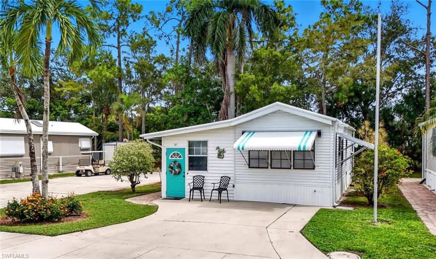 Price recently reduced! Turnkey 1BR + Flex Room / 2BA home in the 55+ gated community of Imperial Wilderness where you own the land! This well-maintained residence lives larger than its size and includes a versatile flex room—pictured in the photos as a second sleeping area—ideal for guests or a home office. Fully furnished and move-in ready with coastal décor, updated lighting, fresh paint, newer appliances, washer/dryer, and paver walkways. The bright layout offers a comfortable living area, upgraded kitchen with modern backsplash, and a primary bedroom with ample storage. Enjoy a private, tree-shaded patio perfect for relaxing outdoors. Imperial Wilderness offers resort-style amenities including two pools, spa, fitness center, pickleball, tennis, shuffleboard, clubhouse, dog park, and an active social calendar. Quarterly HOA includes water, sewer, cable, lawn care, trash, and full access to amenities. No recent hurricane damage and no known flood history. Financing available—ask Realtor for details. A great option for year-round living, seasonal use, or a turnkey income property in a prime Naples location.