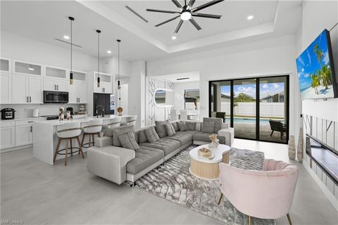Photo of 837 NE 6th PL, CAPE CORAL, FL 33909 (MLS # 2025011467)