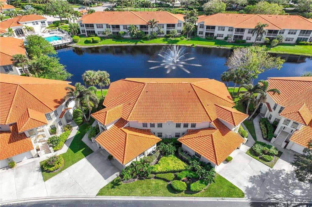 Photo of 1051 Egrets Walk CIR #101, NAPLES, FL 34108 (MLS # 224094019)