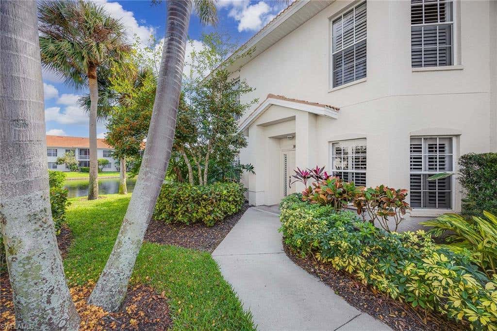 Photo of 1051 Egrets Walk CIR #101, NAPLES, FL 34108 (MLS # 224094019)