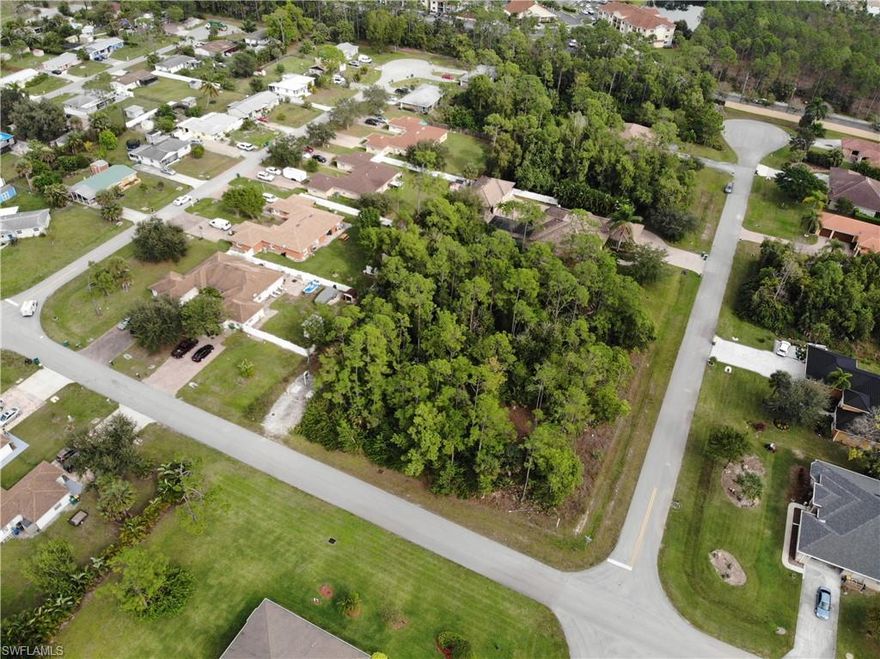What a corner lot! This perfect corner lot is situated in a great community and is just under a half acre! Just off Radio rd., this lot is the perfect opportunity for that new custom home you have been wanting to build. There is plenty of shopping near by and a community park down the road. The peaceful community of Palm Springs Village only has a couple empty lots left. Finding that perfect lot is your goal is't it? Don't miss your chance to build in one of the best kept secret communities in Naples!