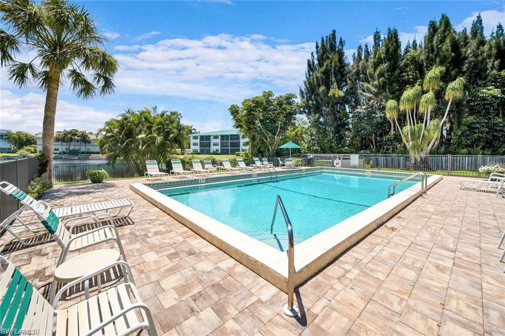 Photo of 3030 Binnacle DR #103, NAPLES, FL 34103 (MLS # 225078418)