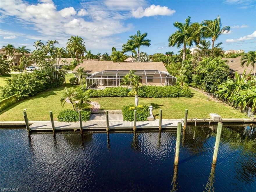 Awesome deep-water canal front value in the best waterfront subdivision in SWFL! Palmetto point offers direct access boating with prime proximity by boat out to the Gulf of Mexico and Pine Island Sound. Wonderful lot overlooking the preserve. Privacy is enjoyed here with no neighbors to look across at while you relax by your pool. Enjoy incredible fishing, waterfront dining and scenic unspoiled views just minutes from your dock. Park multiple boating vessels or your mega yacht here. Great 3 br home with high ceilings, freshly painted, newer kitchen, recessed lighting, fantastic screened in pool area and more. Perfect easy maintenance home or a great lot to build new. Great value!