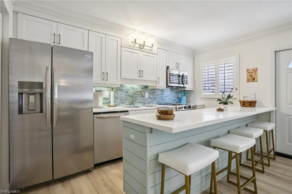 Photo of 980 7th AVE S #104, NAPLES, FL 34102 (MLS # 225047710)