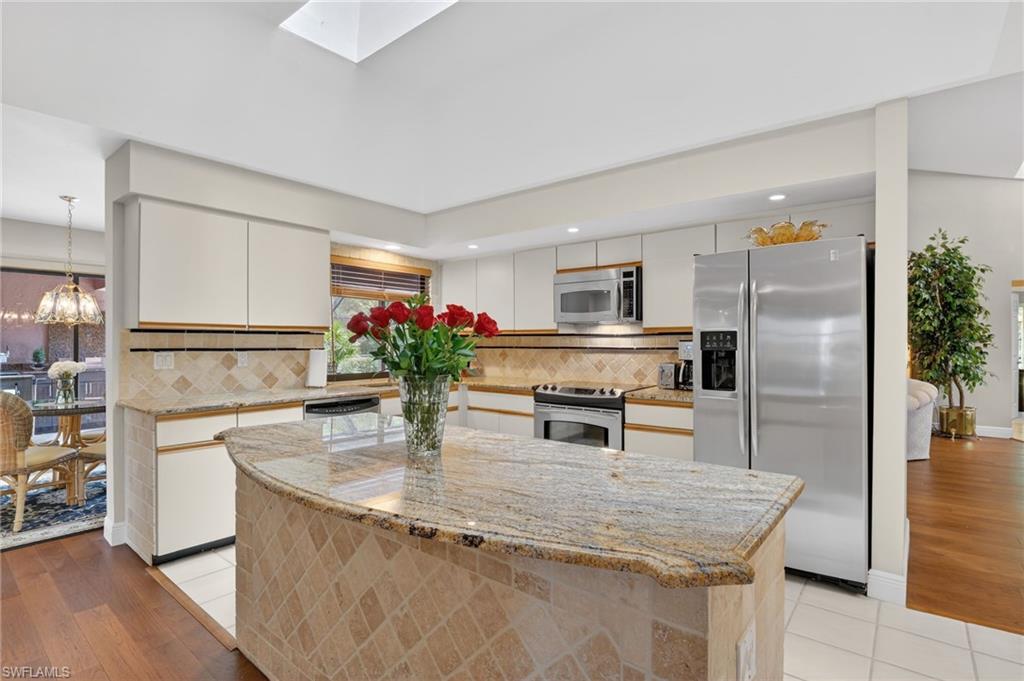 Photo of 812 Pine Creek LN, NAPLES, FL 34108 (MLS # 226032069)