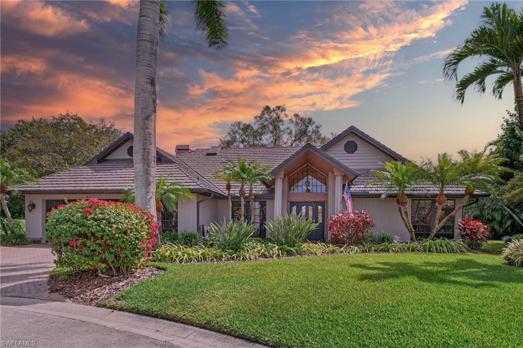 Photo of 812 Pine Creek LN, NAPLES, FL 34108 (MLS # 226032069)