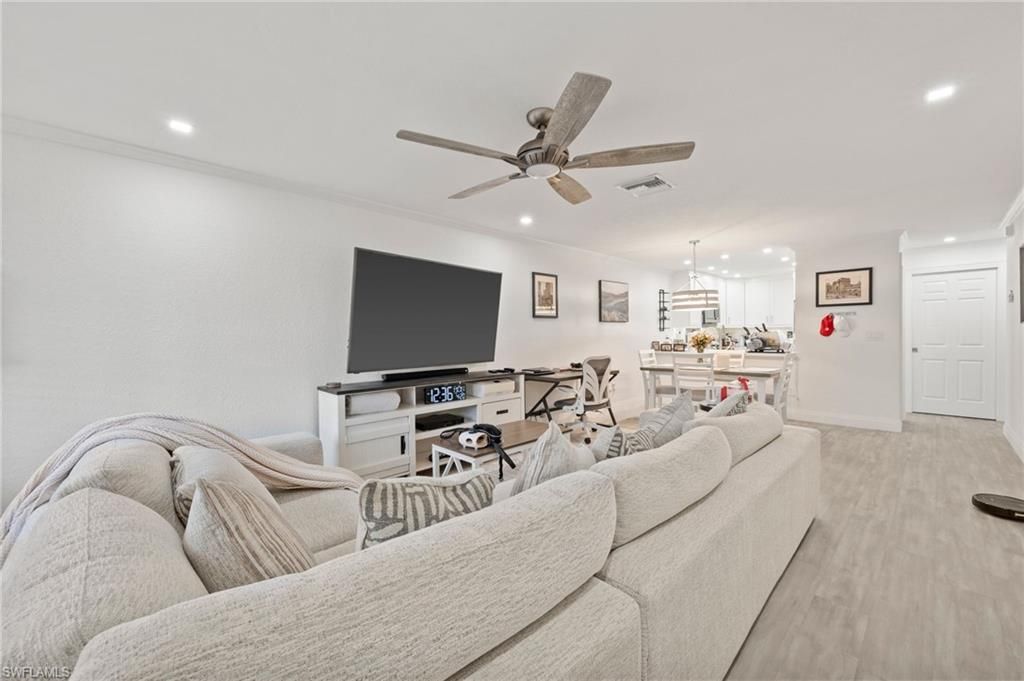 Photo of 55 EMERALD WOODS DR #C3, NAPLES, FL 34108 (MLS # 226015856)