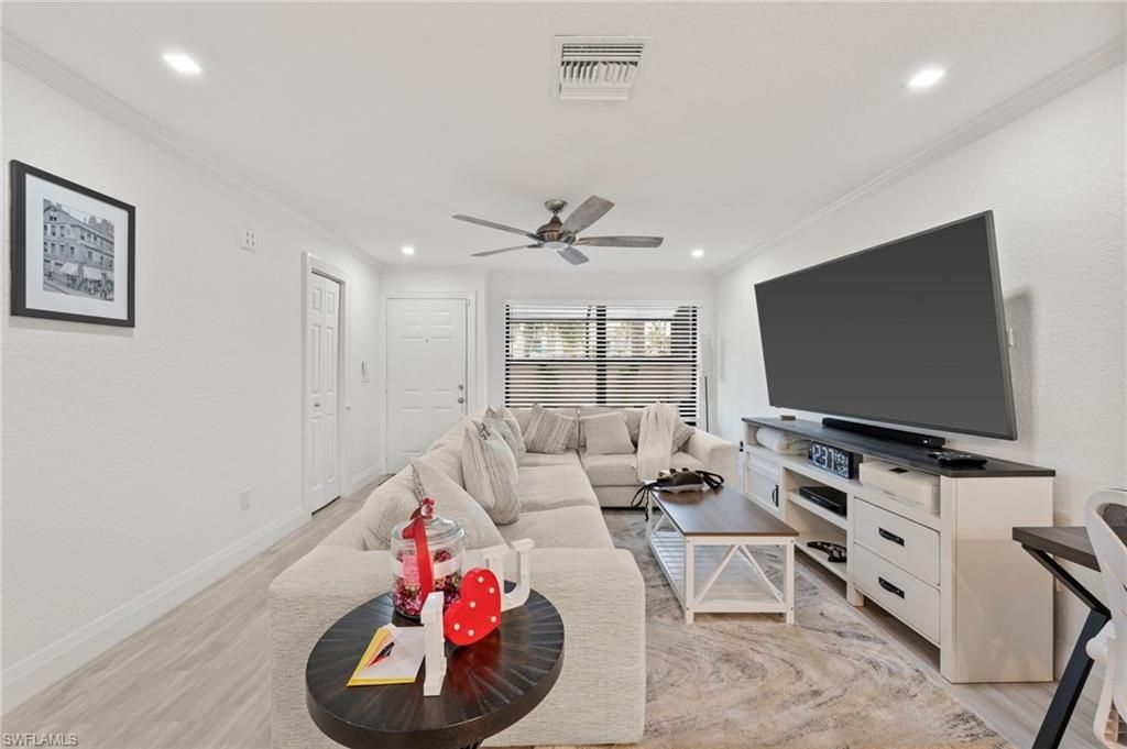 Photo of 55 EMERALD WOODS DR #C3, NAPLES, FL 34108 (MLS # 226015856)