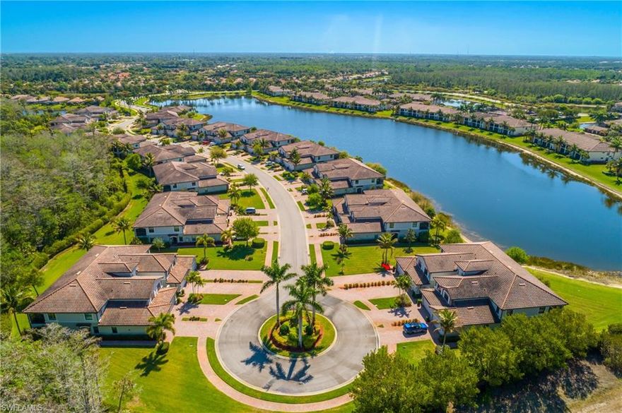 Welcome to 9497 Casoria Ct #101, a highly sought-after social membership, lake side, first-floor coach home in the prestigious, gated community of Treviso Bay in Naples, Florida. Perfectly positioned on a quiet cul-de-sac with an extra-long driveway and no building to your right, this rare 3-bedroom, 2-bath residence with a spacious 2-car garage offers privacy, comfort, and serene lakeside living in one of Naples’ premier resort-style communities.

Step inside to a light-filled, open-concept floor plan designed for both everyday living and entertaining. The living area flows seamlessly to your screened lanai, where tranquil lake views create the perfect backdrop for morning coffee or evening relaxation. Thoughtful upgrades enhance the home throughout, including plantation shutters, a tiled lanai, and electric privacy shades on the sliding glass doors in both the living room and primary suite—offering convenience and a touch of modern luxury.

The revamped laundry room adds both style and function with upgraded washer and dryer, additional cabinetry, and a built-in countertop workspace. An added front screen enclosure allows for refreshing cross-breezes, bringing the Florida lifestyle right into your home. For peace of mind, the AC system was replaced in 2025.

The spacious primary suite offers direct access to the lanai along with peaceful lake views, while two additional bedrooms provide flexibility for guests, a home office, or hobby space. With its first-floor convenience and coach home design, this property lives like a single-family home while offering low-maintenance living.

Treviso Bay is renowned for its world-class amenities and luxury resort lifestyle. Residents with a social membership enjoy access to the stunning Club Rilassare, featuring a resort-style lagoon pool with waterfalls, hot tub, poolside restaurant and bar, state-of-the-art fitness center, full-service spa, tennis courts, pickleball, bocce, and an active social calendar filled with events and activities. The community also offers miles of scenic walking and biking trails, beautifully landscaped grounds, and a vibrant, welcoming atmosphere that makes every day feel like a vacation.  The main clubhouse offers casual and fine dining, as well as a host of different events, and overlooks the private TPC golf course, available to social members May - October.

Located just minutes from downtown Naples, Fifth Avenue South, world-class dining, shopping, and the Gulf’s white-sand beaches, this exceptional property offers the perfect blend of luxury, location, and lifestyle.

Experience the best of Naples living—where you don’t just own a home, you own your day.