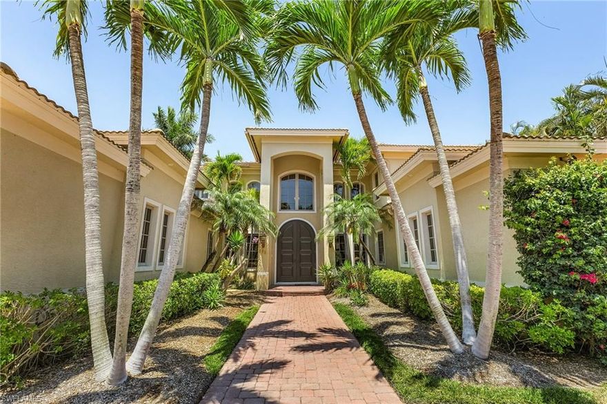 Welcome to 401 Hawser Lane, nestled in the prestigious community of the Moorings in beautiful Naples, Florida. This waterfront gem, with its southern orientation west of Crayton Road, offers direct water access through Doctor's Pass to the Gulf of Mexico. It is perfect for boating enthusiasts. Just minutes from Olde Naples and 5th Avenue, and with exclusive Moorings beach access, you'll immerse yourself in the luxurious Naples lifestyle. A stunning custom-built waterfront home masterfully combines modern design with European elegance. Enjoy panoramic water views from the exquisite pool and spa in your backyard, featuring a spacious covered area and an upper deck on the second floor. As you enter through the grand double mahogany arched doors, you're greeted by breathtaking water views and an expansive two-story great room. The interior showcases an elegantly designed bright and open layout, emphasizing the spectacular bay views. This home offers 4 bedrooms, 3.5 bathrooms, and a 3-car garage. Natural light floods the interior, highlighting the seamless flow between indoor and outdoor living areas. The living spaces are designed for both beauty and functionality, featuring volume ceilings, elegant stone flooring, a large kitchen with a gas stove, and French doors leading to the covered patio. Enjoy a unique blend of privacy and proximity to Naples' finest beaches, shopping, and dining. Located within walking distance to the beach, this property offers an unmatched lifestyle, where your days are marked by breathtaking sunsets over the Gulf. More than just a home, this is a retreat, a sanctuary, and a luxurious waterfront estate promising unparalleled opulence and tranquility.  For the discerning buyer, this property represents a rare opportunity to live in one of the most beautiful settings on the Gulf Coast, with the added allure of direct access to the waterways, making it a boater's paradise.