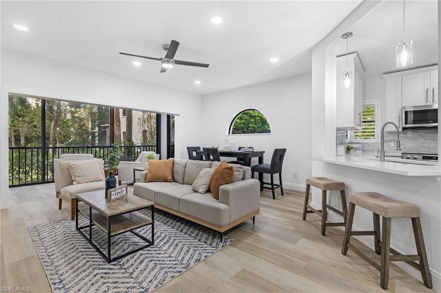 AVAILABLE FOR IMMEDIATE OCCUPANCY / NO IAN DAMAGE!!! Welcome home to the best value, 3 bedroom unit in Pelican Bay. Meticulously and fully renovated; no detail has been spared. Located in Serendipity, this corner unit boasts all NEW flooring and baseboards with an all NEW kitchen that is LIGHT and BRIGHT with brand NEW Samsung smart stainless steel appliances and opens seamlessly into the living area. This freshly painted extended lanai unit includes a bonus sitting room looking out to one of two private pool areas. Enjoy your NEW smart power shades for complete privacy on demand and all NEW custom closets. Rest easy knowing your unit is equipped with IMPACT sliders, a brand NEW smart HVAC, NEW RING doorbell, NEW fiber optics throughout, NEW touch free faucets, NEW fog less mirrors and a NEW Samsung washer & dryer set.

Additional details include all NEW quartz countertops throughout the kitchen and baths, USB outlets, Lutron dimmers with NEW designer light fixtures, fans and LED lighting throughout. The unit also comes with a private storage area.  Pelican Bay features world class amenities and private access to 3 miles of white sand beaches.