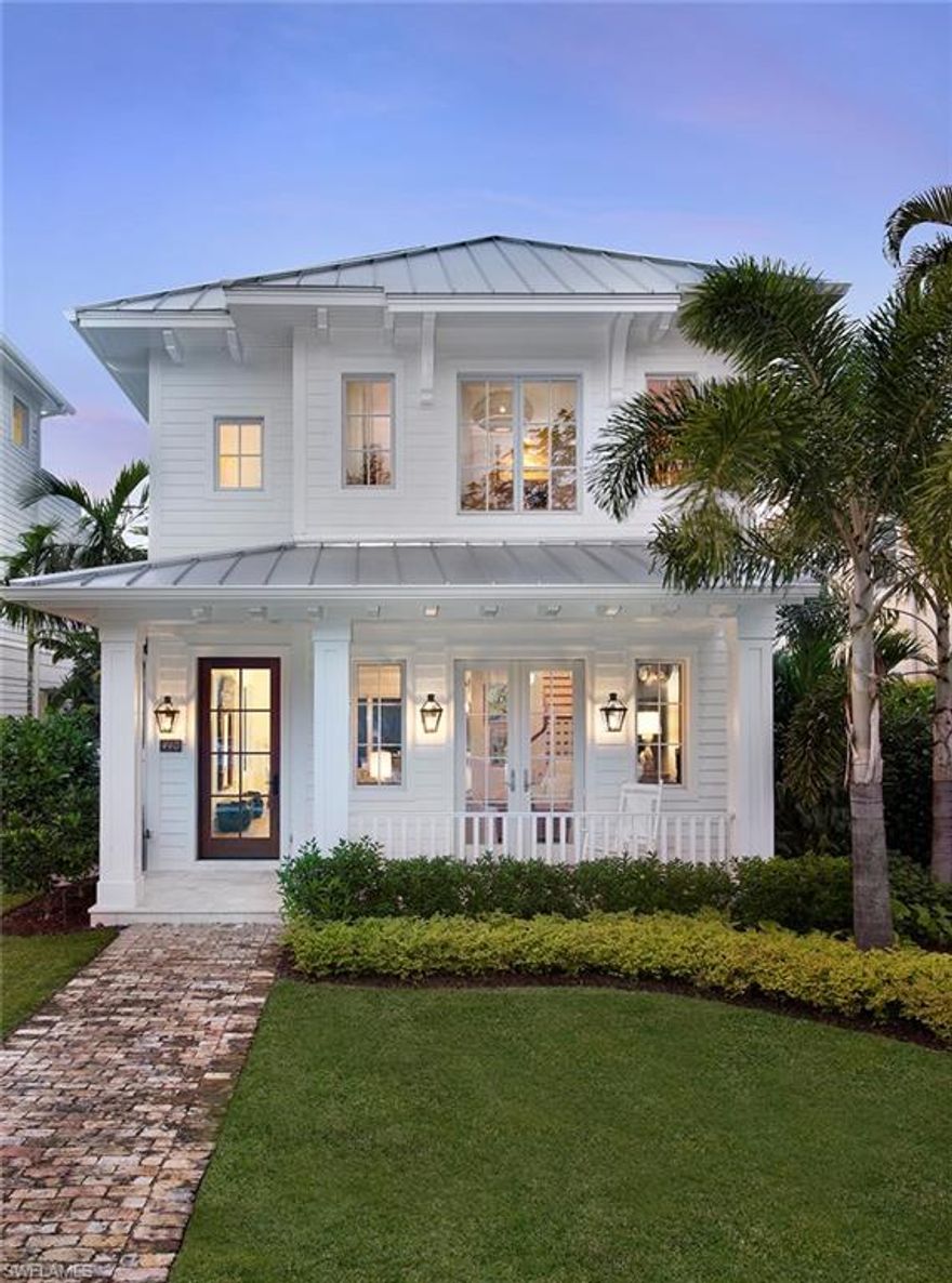 Coastal chic, enticing elegance, and modern luxury meet seamlessly in this designer-decorated, 5-bedroom, 5 ½-bath new construction Old Naples home. Every element is custom and best-in-class, with wide plank Oak flooring, Calcutta and Carrera marble surfaces, Ruffino cabinetry, and appliances from Lacanche, Sub-Zero, Wolf, and Bosch in the gourmet chef’s kitchen. A center courtyard provides a welcoming in-home retreat, featuring a pool and spa as well as an outdoor fireplace and covered seating area. From the center island kitchen through the expansive first level and outdoor courtyard, this home is impeccably primed for entertaining in the finest style, but also tends to your every daily comfort. You’ll fall in love with the incredible natural light throughout the residence, filled with welcoming spaces and little details you’ll continue discovering and appreciating long after unpacking your bags. A house you’ll love to call home, offered perfectly turn-key, and sure to generate oohs and aahs from all your guests and visitors. All of this and the absolute tops in location, too, in the heart of Old Naples and just steps to award-winning beaches, shopping, and dining.