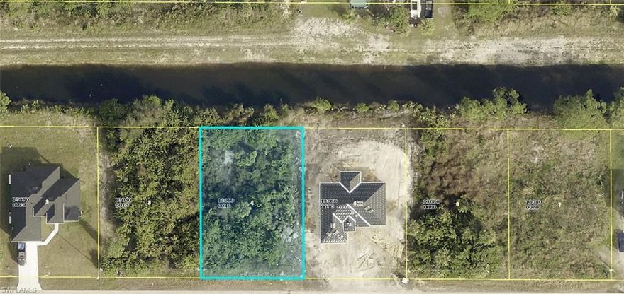 This 1/4-acre lot offers scenic canal views and is situated in the rapidly developing area of Lehigh Acres. Surrounded by new construction, including a newly built home right next door, this lot is conveniently located near essential amenities with easy access to both Highway 82 and Daniels Parkway. It’s an ideal spot to build your dream home or hold as a future investment!