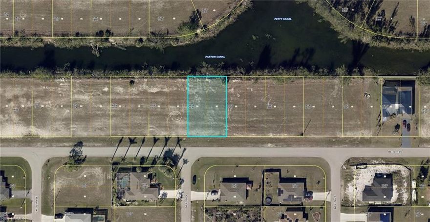 Discover this lot in Cape Coral, FL, perfect for building your dream home on a "high and dry" parcel of WATERFRONT land. These lots are primed and ready for construction. CHEAPEST WATERFRONT LOT IN THE AREA.
