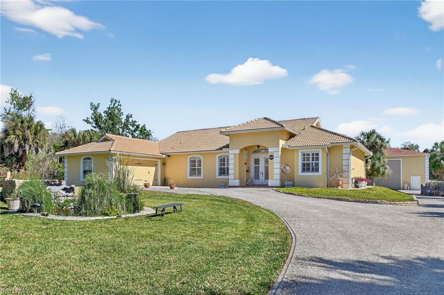 STUNNING "GATED" LANDSCAPED GOLDEN GATE ESTATES HOME! REMODELED, TO SHOW PRIDE OF OWNERSHIP & UPDATED ADDITIONS,  4 BEDROOM, 2 BATH, HEATED SALT WATER POOL- WATERFALL SPA & 40' X 60' X 18' Concrete Block Stucco Garage with 167 MPH rating structure. CONTRACTORS, TRADESMAN, RUN YOUR BUSINESS FROM HOME AS SELLER DOES, CAR COLLECTORS UP TO 30 CAR CAPACITY (YEP YOU READ THAT CORRECTLY), UNLIMITED USES FOR THIS BUILDING WITH 16' x 16' electric OVERHEAD DOOR. With 20" X 20" TILE flooring. VOLUME 14' CEILINGS, recent A/C, REVERSE OSMOSIS WATER FILTRATION, ALL TEXTURED FINISHED WALLS, LOTS OF GLASS WINDOWS & SLIDERS KEEPS HOME LIGHT and BRIGHT ALL YEAR LONG. "CHEFS" KITCHEN WITH ALL LEVEL 5 GRANITE TOPS, white CABINETRY, TILE BACK SPLASH, walk in PANTRY & 12' CENTER ISLAND GRANITE TOPPED WORK STATION AND FAMILY GATHERING SPOT W/6 STOOL CAPACITY. MASTER BEDROOM HAS 12' VOLUME CEILINGS, HIS & HERS WALK-IN CLOSETS, DUAL GRANITE VANITIES, SOAKING TUB AND FLOOR-TO-CEILING OVERSIZED WALK in SHOWER. HOME IS IN A "NO FLOOD" ZONE THIS ESTATE has electric GATED AND COMPLETELY FENCED.  LARGE HEATED-SALT WATER POOL-WATERFALL spa with 1,700sqft lanai WITH "NO SEE'EM" POOL CAGE SCREENING, AND "SOUTH BEACH" VIBE. ADDITIONALLY THERE IS STORAGE AREA FOR LARGE RV'S & BOATS. PROPERTY IS LANDSCAPED,  IRRIGATED,  WITH FRUIT TREES AND KOYI POND.  HOME COMES WITH A ONE YEAR "HOME WARRANTY" FOR TOTAL BUYER COMFORT.