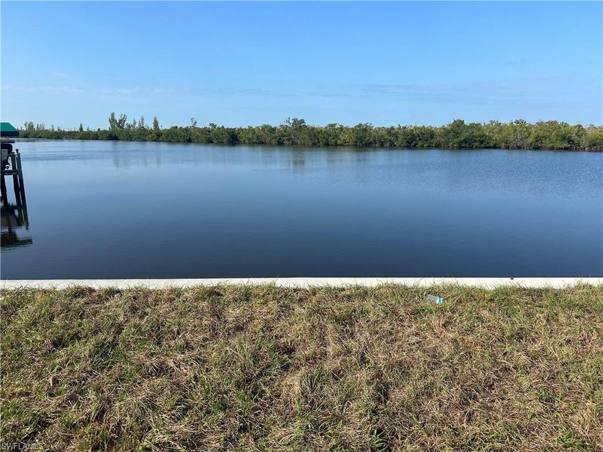 Have you ever dreamed of living on the spreader, well here is your chance. This beautiful oversized property has SW rear exposure- perfect for sunsets. It sits on a large body of water and already has the seawall installed and ready to build!! it is located west of old Burnt Store off of Gulfstream parkway in a highly desirable location! Come check it out.