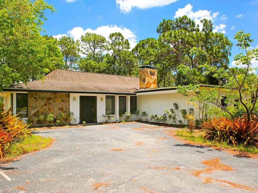 It's nice to have options.  This 3 BDRM 2BA home sits on a 1.1 acre lot in Pine Ridge Estates.  Nestled between multi million dollar mansions, this site is perfectly suited for your dream home.  Underutilizing this prime location, the current home has been upgraded recently, so if you are not quite ready to build, then move in and let your imagination take over. There is a private pool and the kitchen has been totally redone.  The living area has a fireplace and most of the floors have been replaced. This location and lot size offers endless opportunities.  Full of majestic pine trees and natural flora this property offers an incredible canvas for someone to create a masterpiece.  Don't miss out on this exceptional value.