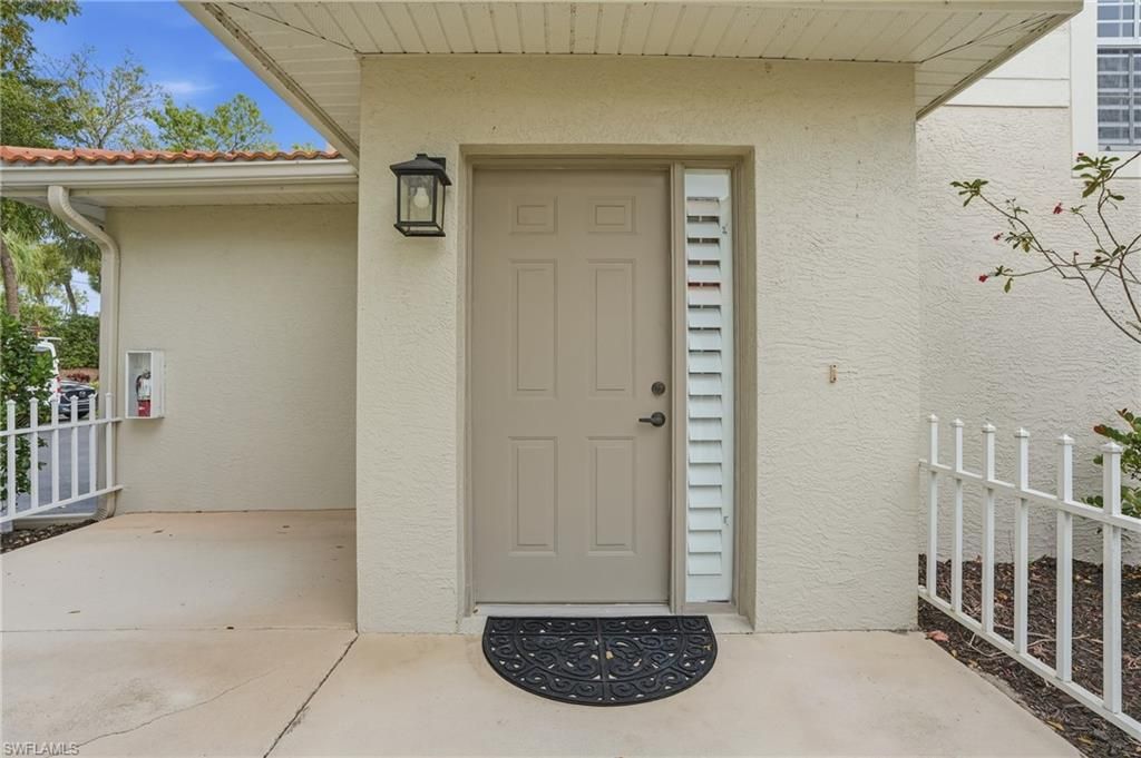 Photo of 7680 Oleander Gate DR #J202, NAPLES, FL 34109 (MLS # 226003874)