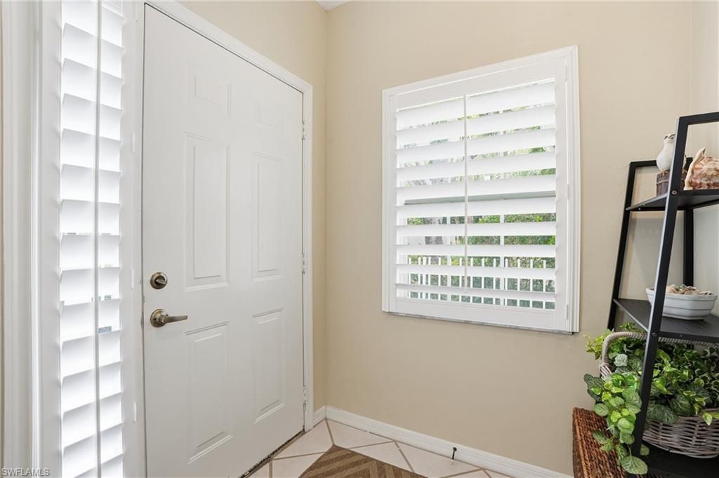 Photo of 7680 Oleander Gate DR #J202, NAPLES, FL 34109 (MLS # 226003874)