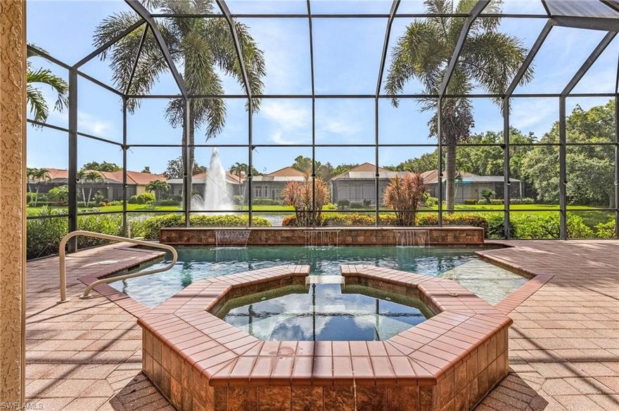 Welcome home to the Grand Cru of class, elegance and beauty in The Vineyards with the stunning Isabella floorplan in the premier, high quality neighborhood of Hammock Isles.  Gorgeous open floor plan with three bedrooms, den with French doors to private outdoor patio. Move right in to meticulously loved and cared for home with many updates including new appliances, front door, bar, outdoor kitchen and more.  Relax and enjoy your beautiful, peaceful life in paradise with the calming water feature and pristine spa, pool and outdoor kitchen area perfect for entertaining.  This home exudes class, style and is your next perfect dream home in paradise!  Located close to everything that creates happiness and minutes from the beautiful beaches of Naples.  Schedule your private showing today! A must see to appreciate, your sparking diamond of the Vineyards!