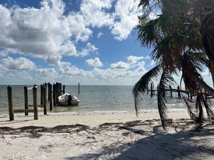 Amazing views of the sunrise over Pine Island Sound and access to miles of pristine beach at Cayo Costa State Park. Property was previously used as a camp with direct access to the Gulf. Being sold as a lot with a previously permitted dock and non-permitted primitive structures. Lot is approximately 80'x125' with State Park land on one side. Mangrove shoreline on the west side of the property. Being sold AS-IS. Accessible by boat only and may be shown only with written permission from the list agent.