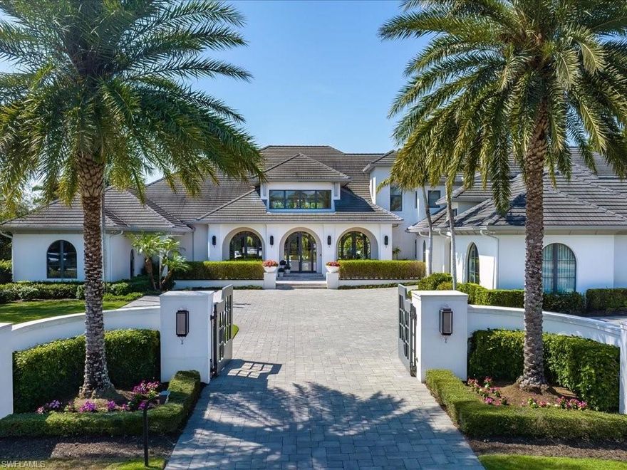 Meticulously designed for luxurious indoor-outdoor living, this sensational custom-built estate will take your breath away! Set on approximately 1.4 acres, its incredible layout presents almost 13,000 sq ft and provides 8 bedrooms accommodated by 9.5 baths. An arched, covered entry opens to an immaculate interior defined by expertly crafted detailing and bespoke features. Natural light fills the soaring ceilings in the main gathering areas, adorned by gorgeous lighting that shapes their contemporary character. As visitors mingle by the living room fireplace, the resident cook can prepare dishes in the chef's kitchen featuring a multi-seater island. A remarkable primary suite showcases double walk-in closets, and its exquisitely tiled ensuite pampers you with a soaking tub and a large glass-enclosed shower. As perks, the bonus rooms include 2 separate offices, a home theater, a game room, and a versatile den. From nightcaps around the fire pit to enjoying a dip in the pool and spa, the expansive backyard is ideal for alfresco entertaining. Notable features are a guest cabana and custom-finished garages that can hold 7 vehicles in total. Come see all this home has to offer and more.