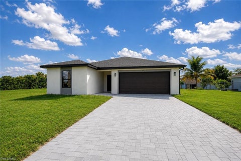 Photo of 4115 9th ST SW, LEHIGH ACRES, FL 33976 (MLS # 226028661)