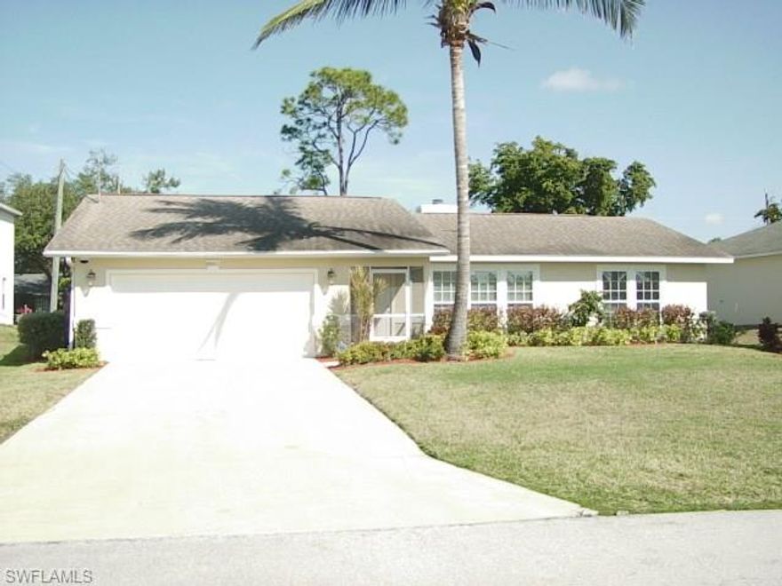 Absolutely beautiful San Carlos home with city water. Large and completely remodeled this home features a large kitchen with soft close cabinets, granite counters and new refrigerator and dishwasher. New laminate flooring thru out the home and new carpeting in all the bedrooms. Huge Living room with wet bar and a fireplace. Home has larger windows which allow lots of natural light. The master bedroom features a walk in closet and an additional den/sitting room with sliders to the lanai. The second and third bedrooms are huge and measure 15.5 x 11 and 13.3 x 12. The entire exterior and interior have just been freshly painted and the roof was new in 2012. Simply, a must see move in ready home. Quality, location and condition make this an easy choice in this price range.