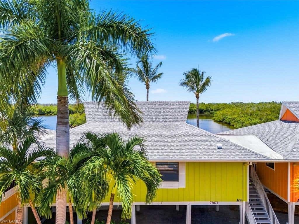 Photo of 27671 Bay Point LN #A2, BONITA SPRINGS, FL 34134 (MLS # 226027410)