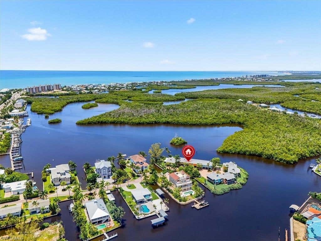 Photo of 27671 Bay Point LN #A2, BONITA SPRINGS, FL 34134 (MLS # 226027410)