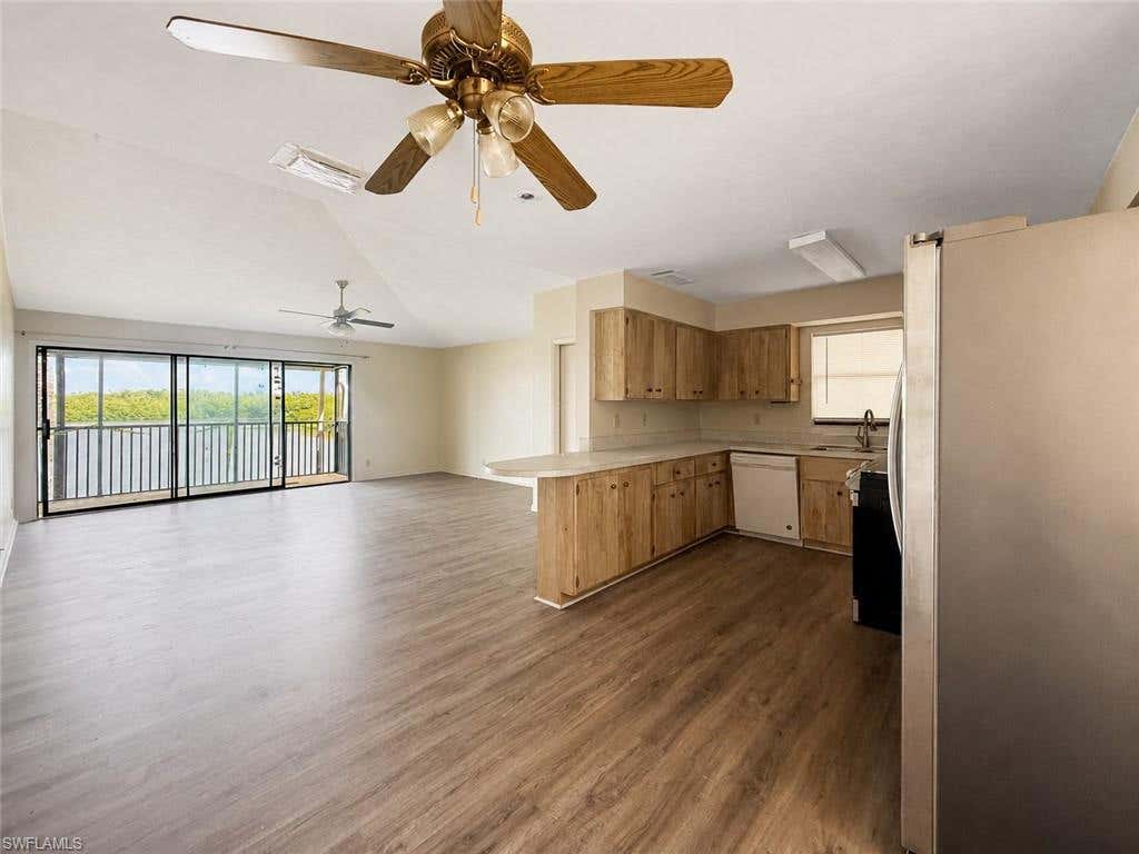 Photo of 27671 Bay Point LN #A2, BONITA SPRINGS, FL 34134 (MLS # 226027410)