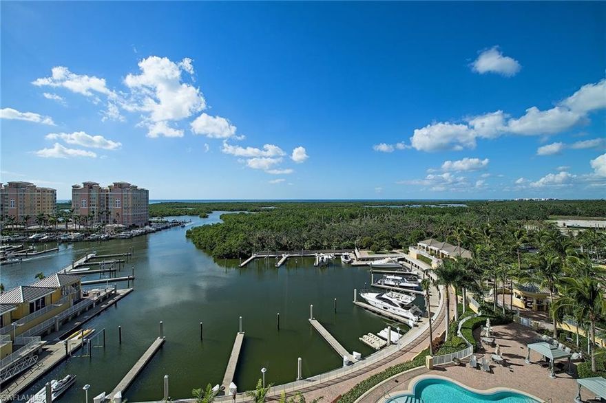 Aqua II, a boutique 32-unit residential tower, is complete and so is this 4,131 square feet, spacious, four-bedroom, three-and-a-half-bath home that shows like a model. Step out of your private elevator to this architecturally redesigned residence. Countless custom features include marble travertine flooring, custom tray ceilings, an expanded redesigned gourmet kitchen which features double ovens, quartz countertops and a gas cooktop. Enjoy your wet bar with dishwasher and wine refrigerator, a beautifully designed fireplace and an added bonus, your PRIVATE TWO-CAR GARAGE. The lanai boasts the splendor of extraordinary views of the Gulf of Mexico, where you can relax with your guests while preparing your favorite meal on your very own gas grill. Amenities in Aqua include resort-style pool and spas, steam rooms and dry saunas, Virtual Golf Simulator, Outdoor Putting Green, Dog Run, 9th Sky Lounge and Rooftop Terrace Grill and Hot Tub, Private Marina, guest suites, 24-hour concierge, PET-FRIENDLY, TWO PETS — NO SIZE LIMITS. This Gulf of Mexico, sunset viewing, one-of-a-kind home will welcome you to enjoy the unmatched Naples Lifestyle. *(See Confidential Information about Garage).