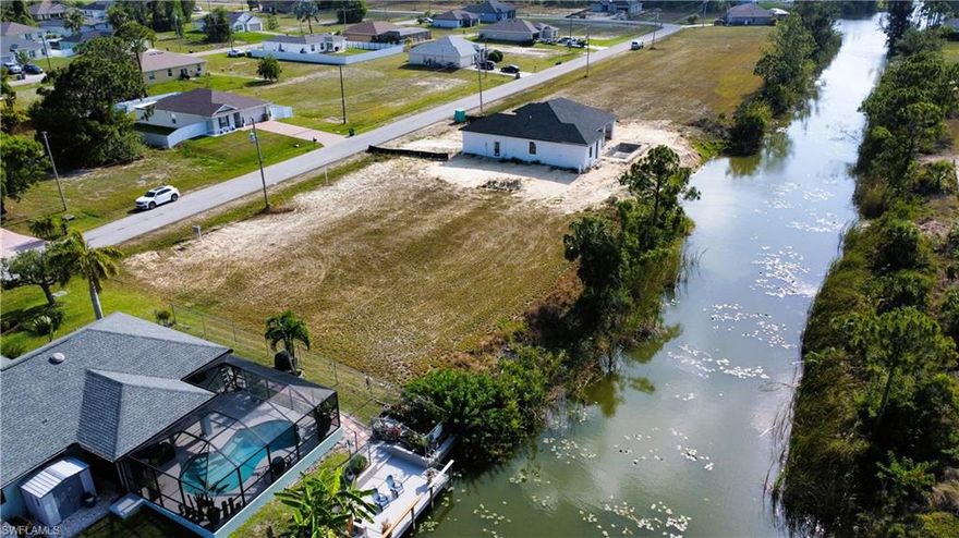 This cleared, waterfront lot is ready for your new pool home! Situated in a desirable area of NE Cape Coral within a short drive to Del Prado Blvd and Pine Island Road, US41, and I75, and only a 15-minute drive to Downtown Fort Myers without paying a toll! Being just minutes away from Island Coast High School and Diplomat Middle and Elementary makes this a great family-oriented neighborhood. Don't miss out on this opportunity to start building your waterfront home right away! Thank you for your interest in my listing.