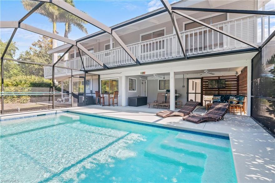 This Turn Key classic Florida island home is located within the Alden Pines neighborhood, only a mere 1/2 mile from a full-service marina and one of Pine Island's finest restaurants, The Tarpon Lodge. Its neighborhood and surrounding areas are among the most highly desired on Pine Island, which exude the ambiance of old-time community and the convenience of accessing the water and dining with ease. With a boat ramp and boat storage nearby, hitting the water is simple and you'll have direct access to the most sought-after beaches and islands southwest Florida has to offer. Cayo Costa State Park and its 7.5 miles of pristine beaches is only 6.5 miles away by boat, with Boca Grande, Sanibel, Captiva, North Captiva and Cabbage Key all within easy reach. Retreat from the water to your private pool and peaceful neighborhood while avoiding the headaches of city traffic and congestion. The home features two levels, each with independent living spaces and bedrooms. The primary living floor is the uppermost level, complete with a spacious family room, kitchen, and dining room, all of which are encircled by a wraparound porch overlooking tropical landscaping to the west. There are two bedrooms on the primary floor, with one guest room & en-suite bathroom on the south side and a very spacious Master to the north, with its high ceilings, big windows and large bathroom. The tastefully updated kitchen is extremely roomy and flows directly into the formal dining room which features high ceilings and an abundance of natural light. The ground floor has an independent living space complete with kitchenette, living room, a bedroom and bathroom. Directly outside is an inground heated concrete pool installed new in 2021, with additional entertainment space located within the screen enclosure. A two-bay garage with additional storage and space enough for a workbench round out the ground floor space. Tasteful appointments with warm, natural-wood ceilings and coastal decor are the common theme throughout home. The Seller recently performed a complete re-screw of the roof, and the HVAC was replaced in 2022. This would make a fantastic vacation rental or rent the upstairs and use the private downstairs as a vacation home. This is Full Turn Key, with furniture and fully stocked kitchen and baths. Just bring your suitcase and move right in.