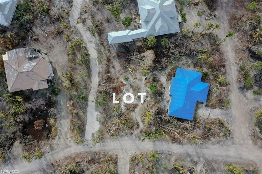 Practically beachfront and conveniently located across from the community amenities, including a heated pool, tennis, and a club room.  One of the last remaining well elevated parcels on Sanibel!  Direct beach path from this parcel.  WOW!