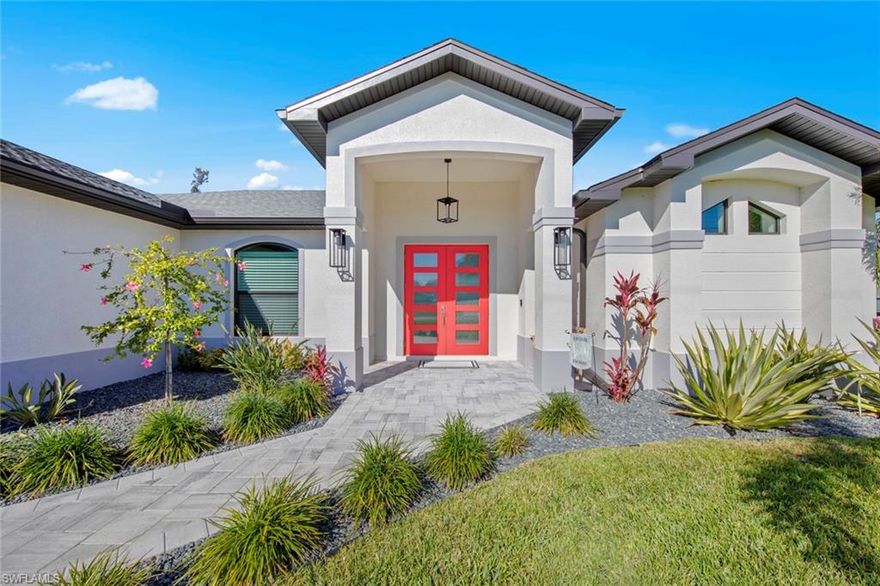 Presenting a custom-built 3 Bedroom 2 Bath Plus Den home by Ramos Builders (2023), situated on one of the largest freshwater canal systems with direct access to Lake Kennedy. The property features numerous upgrades including hurricane-resistant windows and doors, custom solid wood cabinets, tile flooring throughout, with upgraded granite, tile backsplash. Additional highlights include tray ceilings in the breakfast nook, living room, and owner's bedroom, Eight Foot interior doors, 5” moldings, a generator transfer switch, Storm Smart remote-controlled shutters that can with stand winds up to 165 mph for the lanai, corner sliding doors providing access to the lanai, exterior lighting, under-cabinet lighting, custom landscaping, an extra-wide driveway, a utility sink in the garage, underground electric feed, an upgraded garage door opener, fenced in backyard, saltwater pool, reverse osmosis system under the kitchen sink, and gutters surrounding the entire home. The outdoor living space is expansive and perfect for entertaining and relaxing. Conveniently located close to Challenger Middle School, Trafalgar Middle School and Mariner High School, this home offers easy access to local amenities, and is minutes from Pine Island and 30 minutes from Punta Gorda and RSW. This nearly new home offers move-in readiness without the wait of new construction. NOT in a Flood Zone!!!!