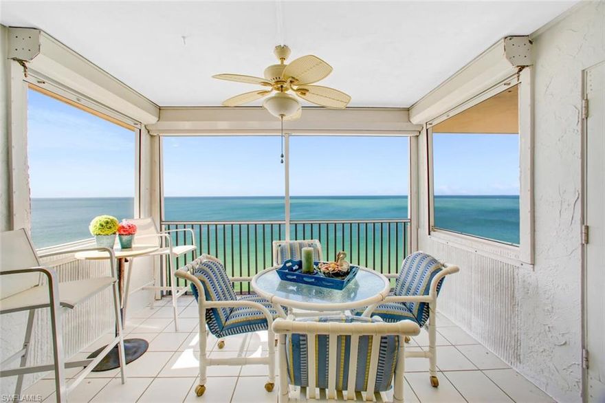 PENTHOUSE/9TH FLOOR, END UNIT, RENOVATED & MOVE-IN-READY IN THE EGRET ON BONITA BEACH… This South-side end unit with coastal contemporary finishes & décor will not last. LAST PENTHOUSE SOLD IN THE EGRET WAS 7 YEARS AGO! From the new quartz counters, to the renovated kitchen with ALL NEW appliances &  white cabinetry, to the whole-unit tile floors & new paint throughout, this TURNKEY unit is move-in-ready & awaiting its lucky future owner. Boasts the finest view on Hickory Island, with PANORAMIC WRAPAROUND WATER VIEWS including beach views down the coast all the way to Naples/Marco Island & rare Bay views from the East. Enjoy the sounds of rolling waves & warm ocean breeze from your direct beachfront balcony, with unobstructed top floor views & automatic shutters for your convenience. Includes one of the only rare covered parking spaces in the building. The Egret boasts lushly landscaped tropical grounds with a heated beachfront pool, community room with full kitchen, BBQ area & more. Perfect location steps to waterfront restaurants & fine shopping/dining at the Promenade, Mercato & Waterside Shops. Enjoy paradise with this perfect vacation home or as a rental income opportunity.