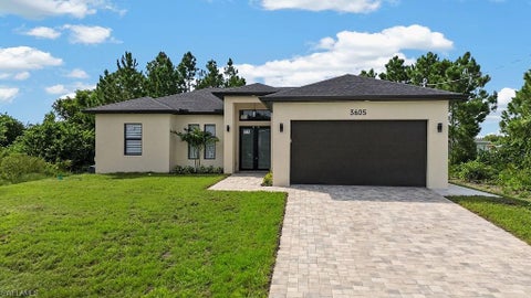 Photo of 3605 18th ST SW, LEHIGH ACRES, FL 33976 (MLS # 226034545)