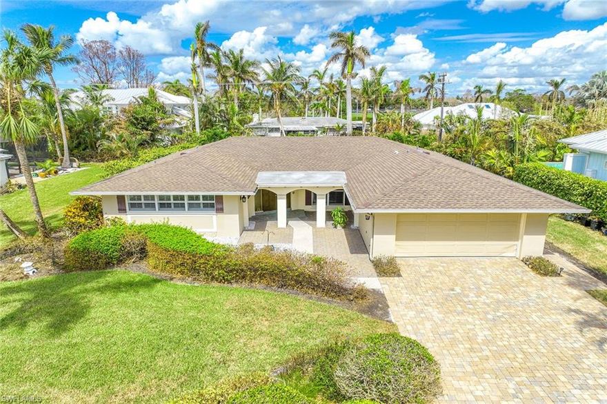 Price is Right!  An amazing opportunity exists to be located just steps away from the white sandy beaches of the Gulf of Mexico and all that Old Naples has to offer, this rare opportunity to update, enhance or build on your own slice of paradise is a must see. Vibrant nightlife, dining, shopping, beaches, healthcare, boating and the new Four Seasons Resort property all just moments away. Currently situated on the 0.29-acre lot is a charming 3-bedroom, 2-bath large covered lanai home across the street from one of the area's peaceful nature-oriented lakes. The lot is roughly 95 ft wide by 135 ft deep.   Excellent Rental Opportunity as well.