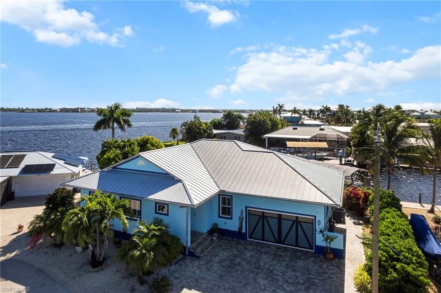 Welcome to 2743 Janet Street, nestled in the sought-after Island Harbors community of Matlacha a true boater's and angler's paradise. This beautifully maintained 4-bedroom, 3-bath home with a 2-car garage offers the perfect blend of coastal charm and modern comfort. Set on a wide canal with direct access to open water, this home is a dream come true for anyone who loves fishing, boating, or simply soaking in serene waterfront views. Inside, you'll find a bright, open floor plan ideal for entertaining, featuring spacious living areas, a well- appointed kitchen, and generous bedrooms designed for comfort and privacy. Enjoy your mornings on the lanai watching dolphins play, or head out for a day on the water straight from your own backyard. Best of all, this property sustained zero flood damage, offering peace of mind and immediate move-in readiness. This home is Built Florida tough! Experience the best of island living with nearby shops, art galleries, and waterfront dining just minutes away. Whether you're seeking a year- round residence or a tropical getaway, 2743 Janet Street delivers the ultimate Matlacha lifestyle.